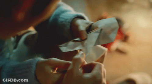 Person Holding Paper GIF