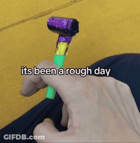 Person Holding Party Horn Saying Its Been A Rough Day GIF