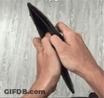Person Holding Pen GIF