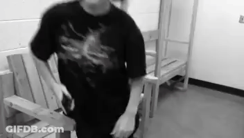 Person Holding Pen In Front Of Bright Light GIF