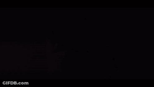 Person Holding Pen In Front Of Bright Light GIF