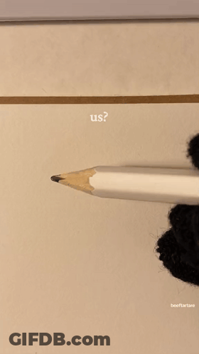 Person Holding Pencil In Front Of Us Drawing GIF