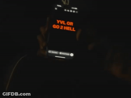 Person Holding Phone Saying Yvl Or Go2 Hell GIF