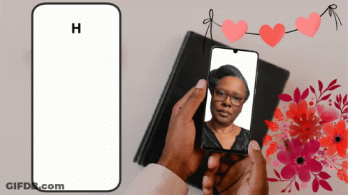 Person Holding Phone With Picture Of Woman GIF