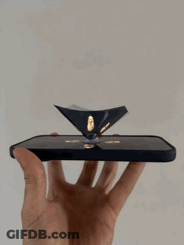 Person Holding Phone With Pyramid GIF