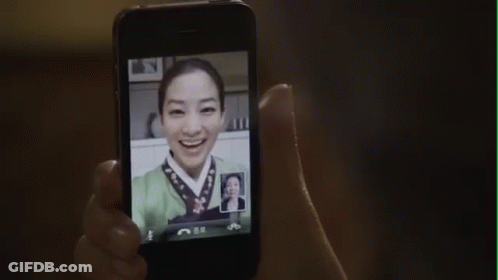 Person Holding Phone With Woman Picture GIF