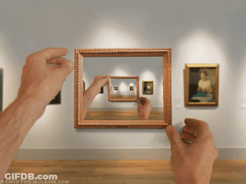 Person Holding Picture Frame At Museum Remixthemuseum.com GIF