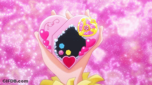 Person Holding Pink Heart On Purple Background GIF