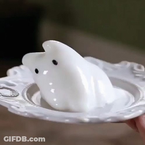 Person Holding Plate With Ghost GIF