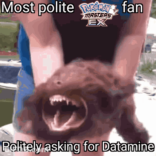 Person Holding Pokemon Masters EX Pokemon GIF