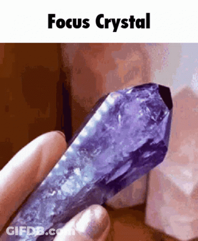 Person Holding Purple Crystal Focus GIF