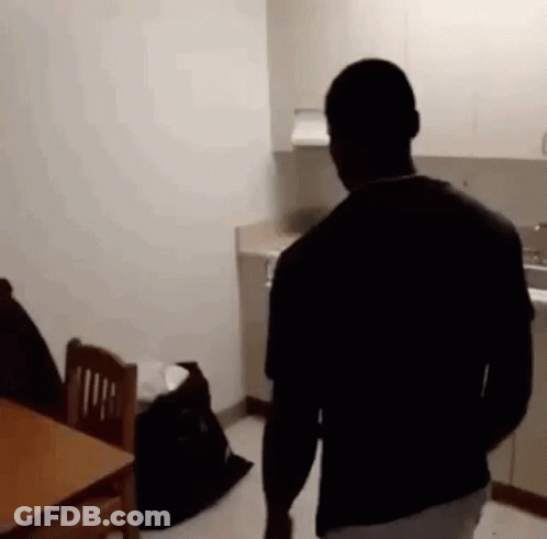 Person Holding Purple Object GIF