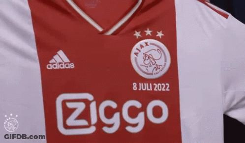Person Holding Red And White Adidas Shirt GIF