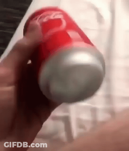 Person Holding Red Coca Cola Can GIF