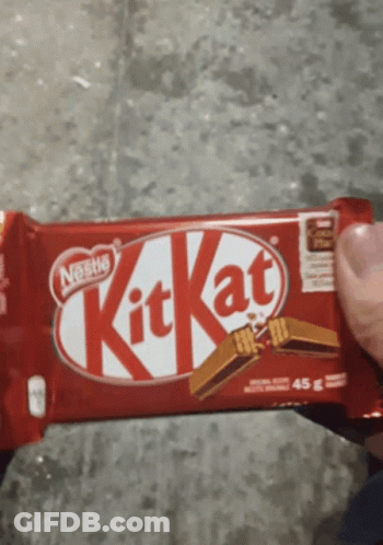 Person Holding Red KitKat Bar GIF