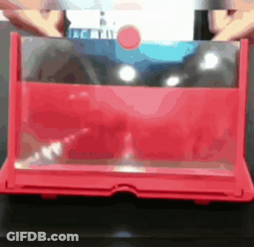 Person Holding Red Laptop GIF
