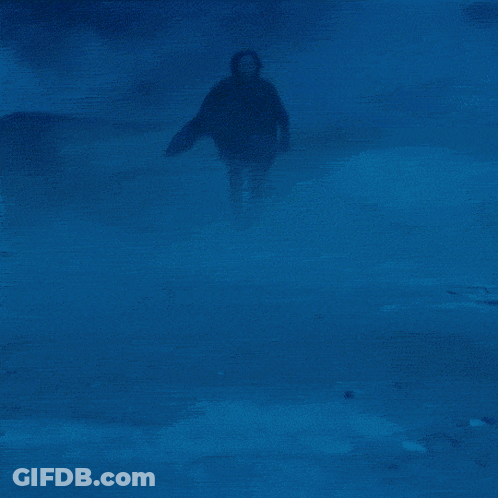 Person Holding Red Light Beam GIF