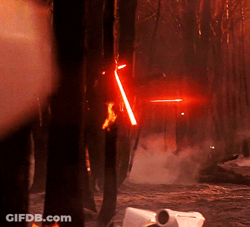 Person Holding Red Lightsaber GIF