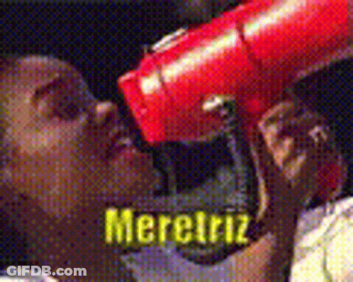 Person Holding Red Object In Front Of Mouth Saying Merciriz GIF