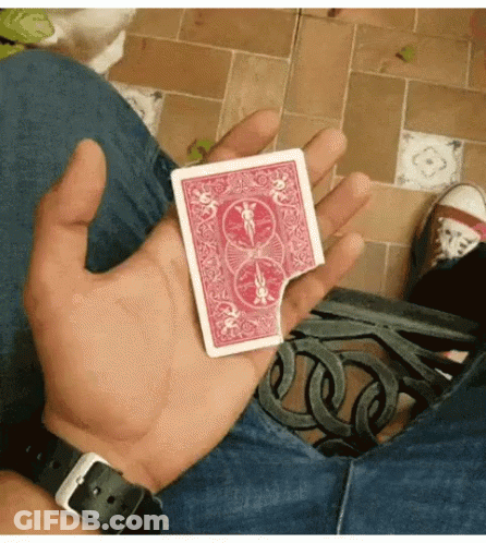 Person Holding Red Playing Card With Number 8 GIF