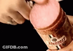 Person Holding Reiner's Sausage Bottle GIF