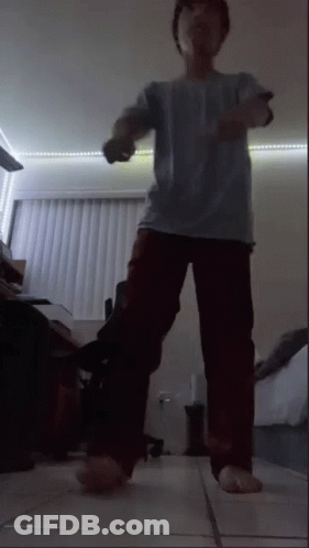 Person Holding Remote Control GIF