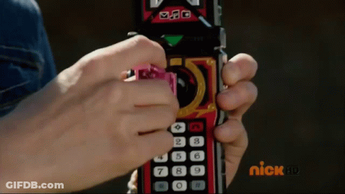Person Holding Remote With Nick HD Logo GIF