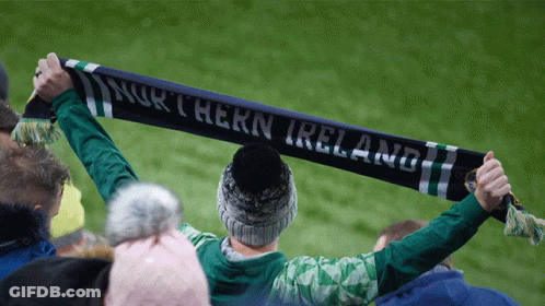 Person Holding Scarf Saying Northern Ireland GIF