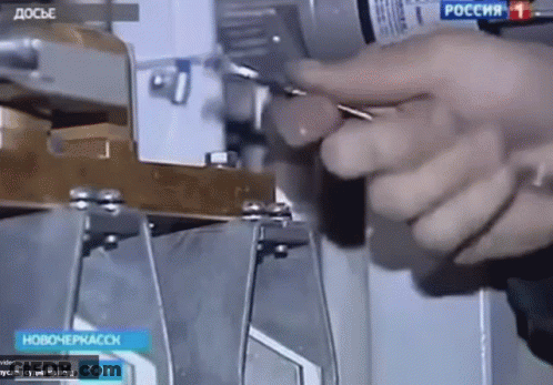 Person Holding Screwdriver GIF