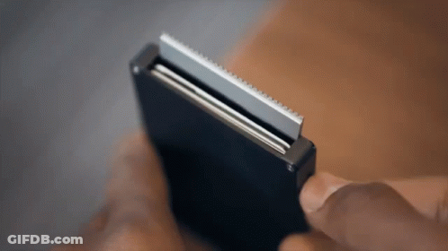 Person Holding Shaving Razor GIF