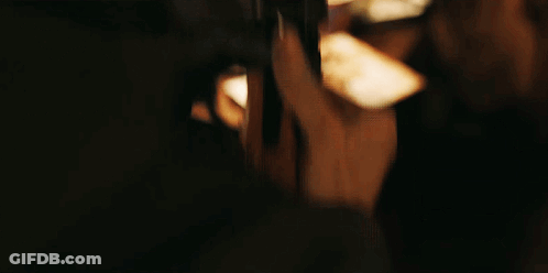 Person Holding Shotgun GIF