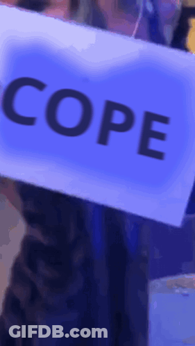 Person Holding Sign Saying Cope GIF