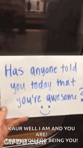 Person Holding Sign Saying Has Anyone Told You Today That You're Awesome GIF