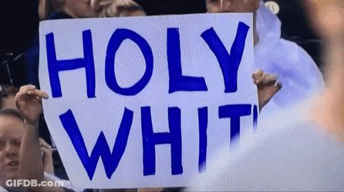 Person Holding Sign Saying Holy White GIF