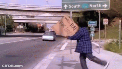 Person Holding Sign Saying Will Rap For Food GIF