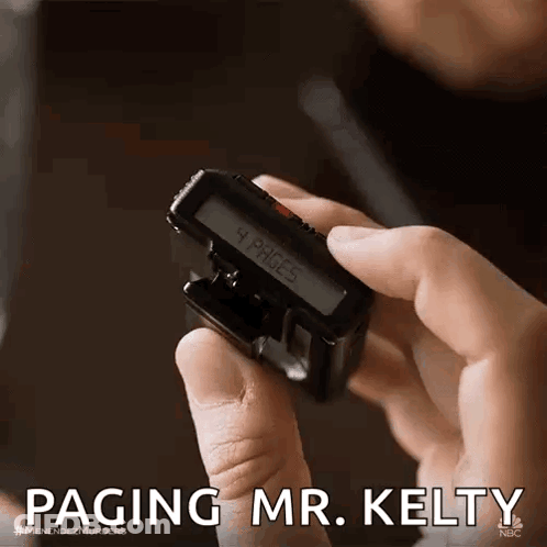 Person Holding Small Device With Pink Screen GIF