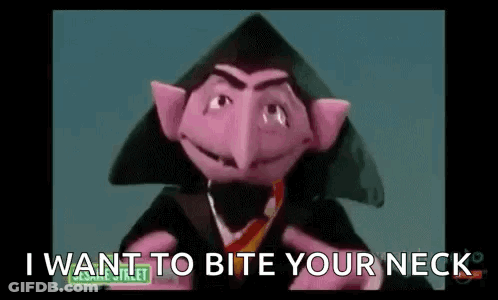 Person Holding Sony Controller GIF