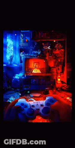 Person Holding Sony Controller GIF