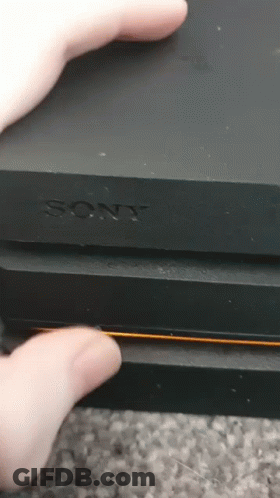 Person Holding Sony Device GIF