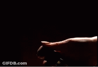 Person Holding Spray Bottle With Smoke GIF