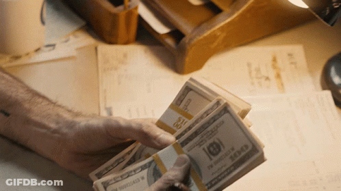 Person Holding Stack Of 100 Dollar Bills GIF