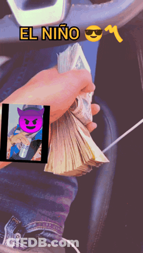 Person Holding Stack Of Money With El Niño GIF