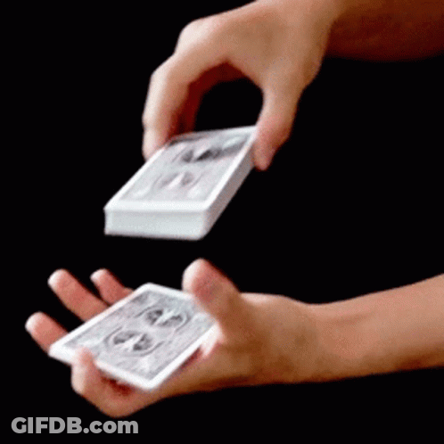 Person Holding Stack Of Playing Cards GIF