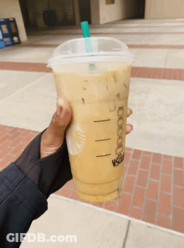 Person Holding Starbucks Drink With Straw GIF