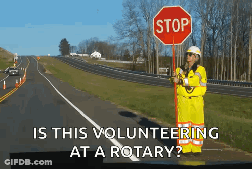 Person Holding Stop Sign GIF