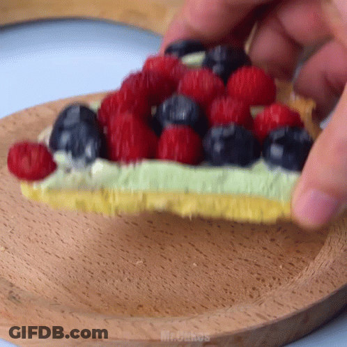 Person Holding Strawberry Cake GIF