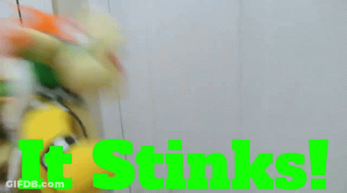 Person Holding Stuffed Animal Saying It Stinks GIF