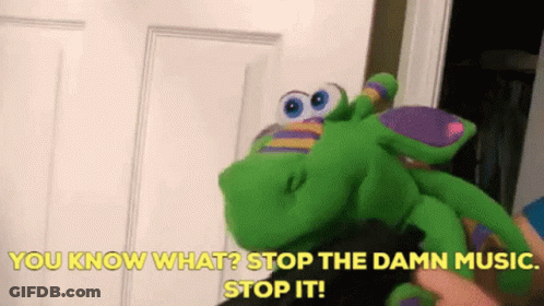 Person Holding Stuffed Animal Saying Stop Damn Music GIF