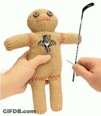Person Holding Stuffed Doll And Hockey Stick GIF