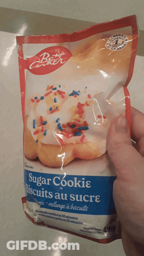 Person Holding Sugar Cookie Mix GIF